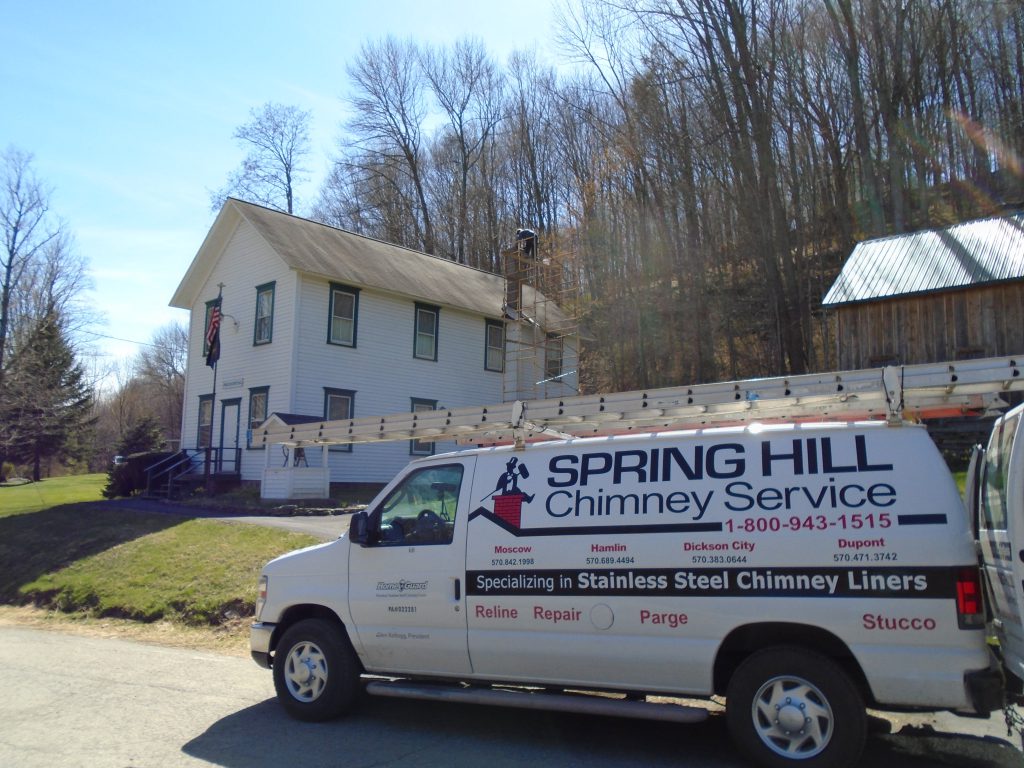 Spring HIll Chimney Service working at Greene-Dreher Historical Society