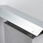 Metal step flashing and counter flashing installed where a brick chimney meets a shingled roof — Spring Hill Chimney Service NEPA